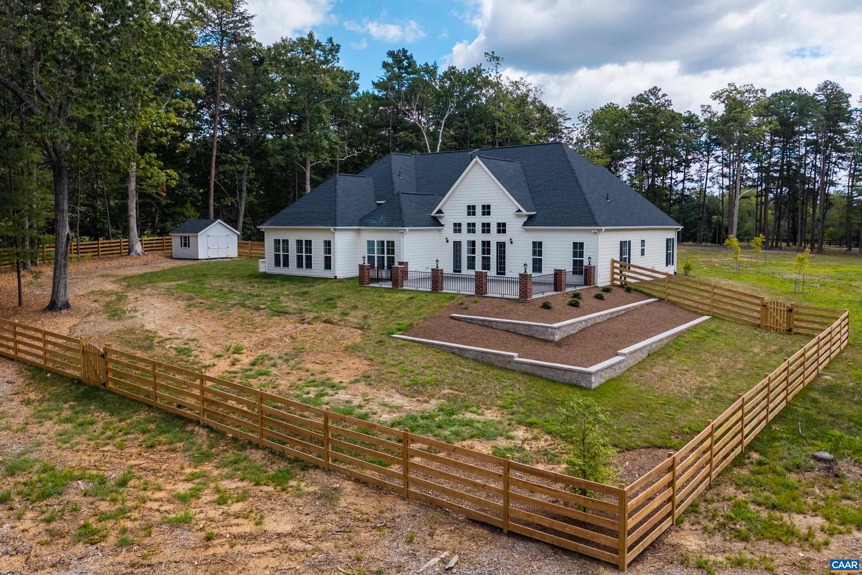 240 Campbell Road Keswick, VA 22947 - Photo 6 of 68 a front view of a house with garden