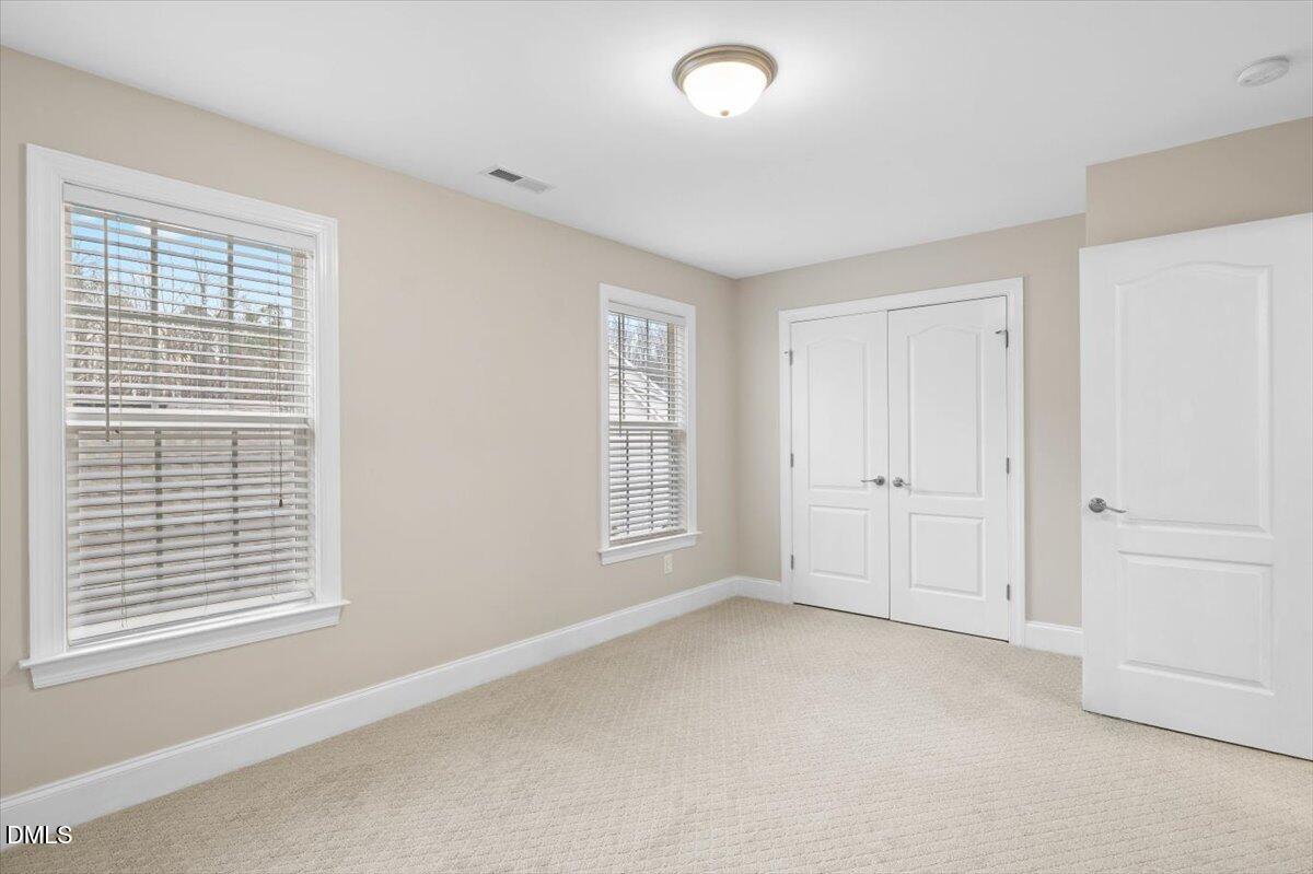 2000 Castana Court Willow Spring, NC 27592 - Photo 11 of 20 a view of an empty room with a window