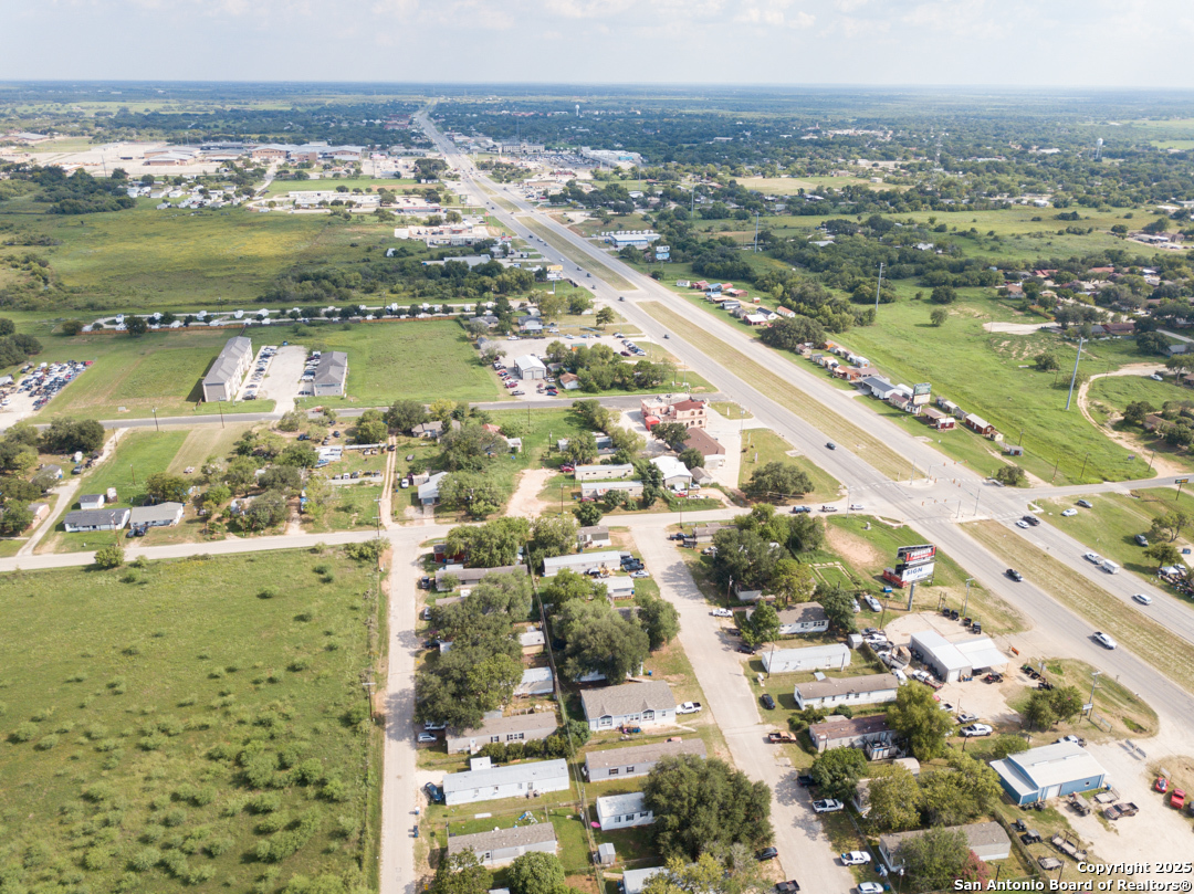 1804 Sutherland Springs Road Floresville, TX 78114 - Photo 1 of 23 a view of a city with an ocean view