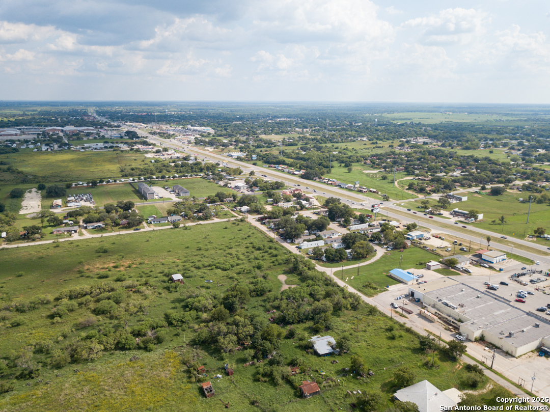 1804 Sutherland Springs Road Floresville, TX 78114 - Photo 11 of 23 an aerial view of residential houses with outdoor space