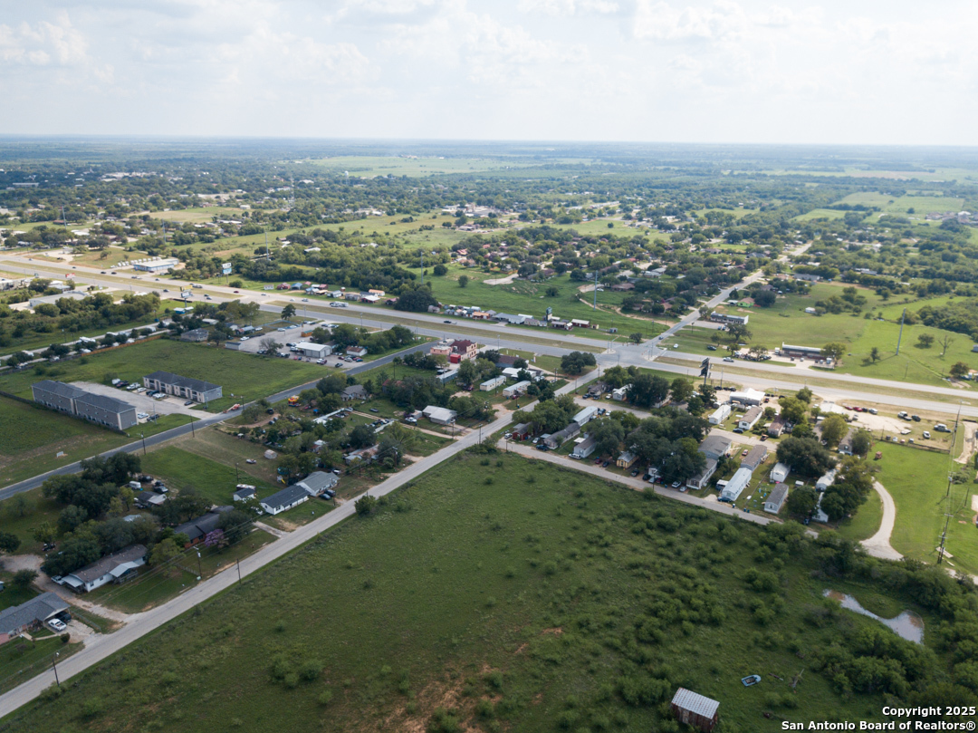 1804 Sutherland Springs Road Floresville, TX 78114 - Photo 5 of 23 an aerial view of a residential houses with outdoor space and river