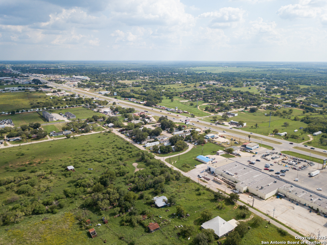 1804 Sutherland Springs Road Floresville, TX 78114 - Photo 10 of 23 an aerial view of residential building and lake