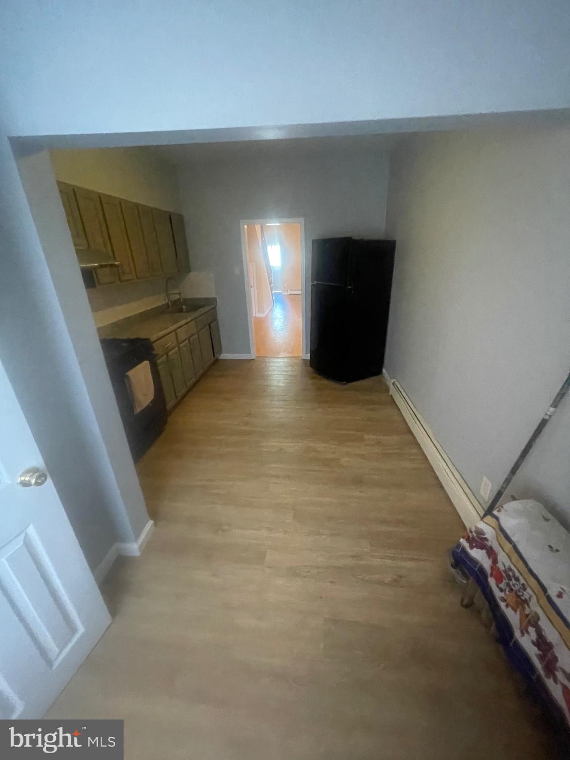 1644 Granite Street Philadelphia, PA 19124 - Photo 13 of 21 a view of an empty room with wooden floor