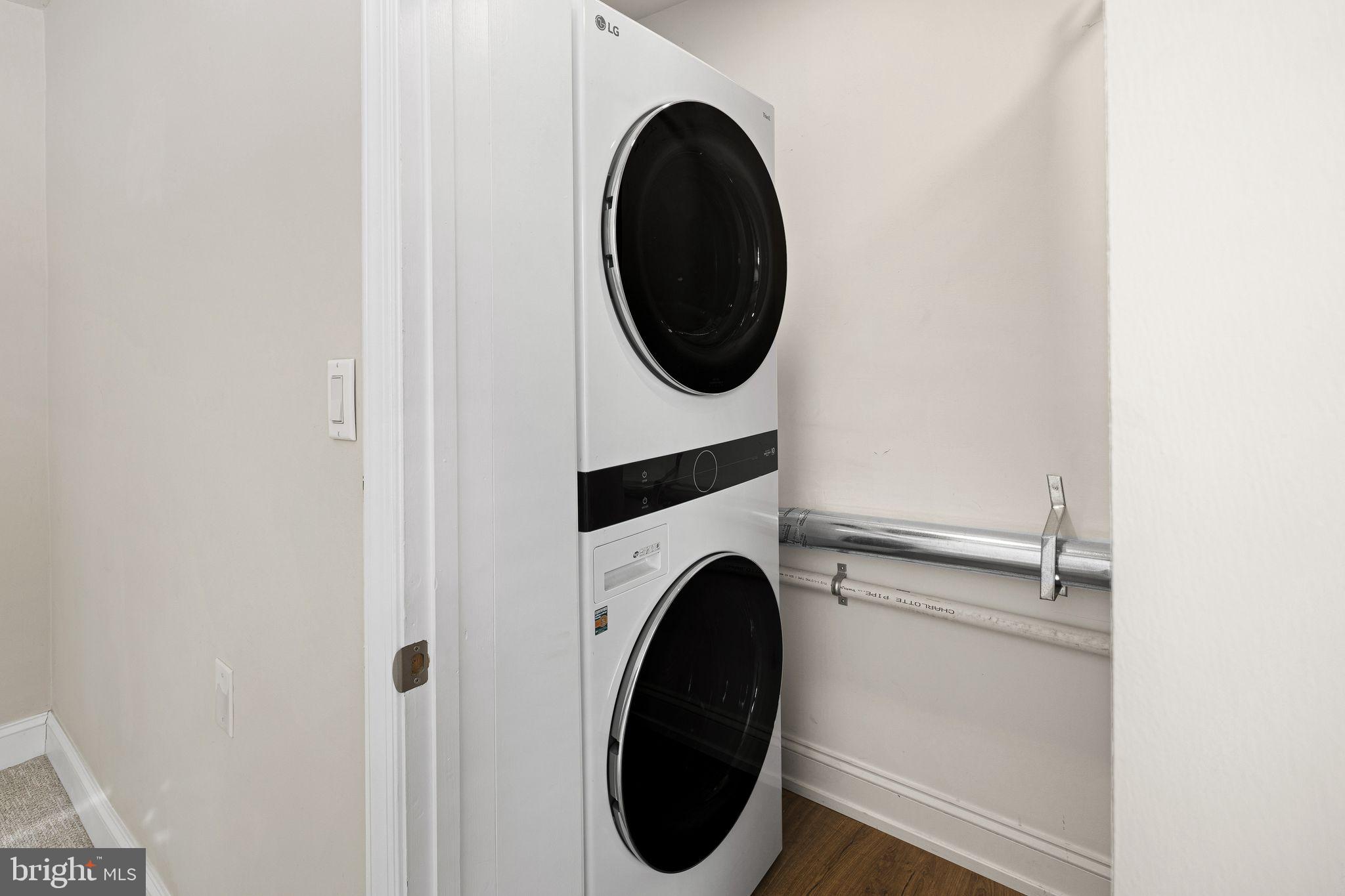 910 Edann Road Oreland, PA 19075 - Photo 15 of 26 a close view of a utility room with dryer and washer