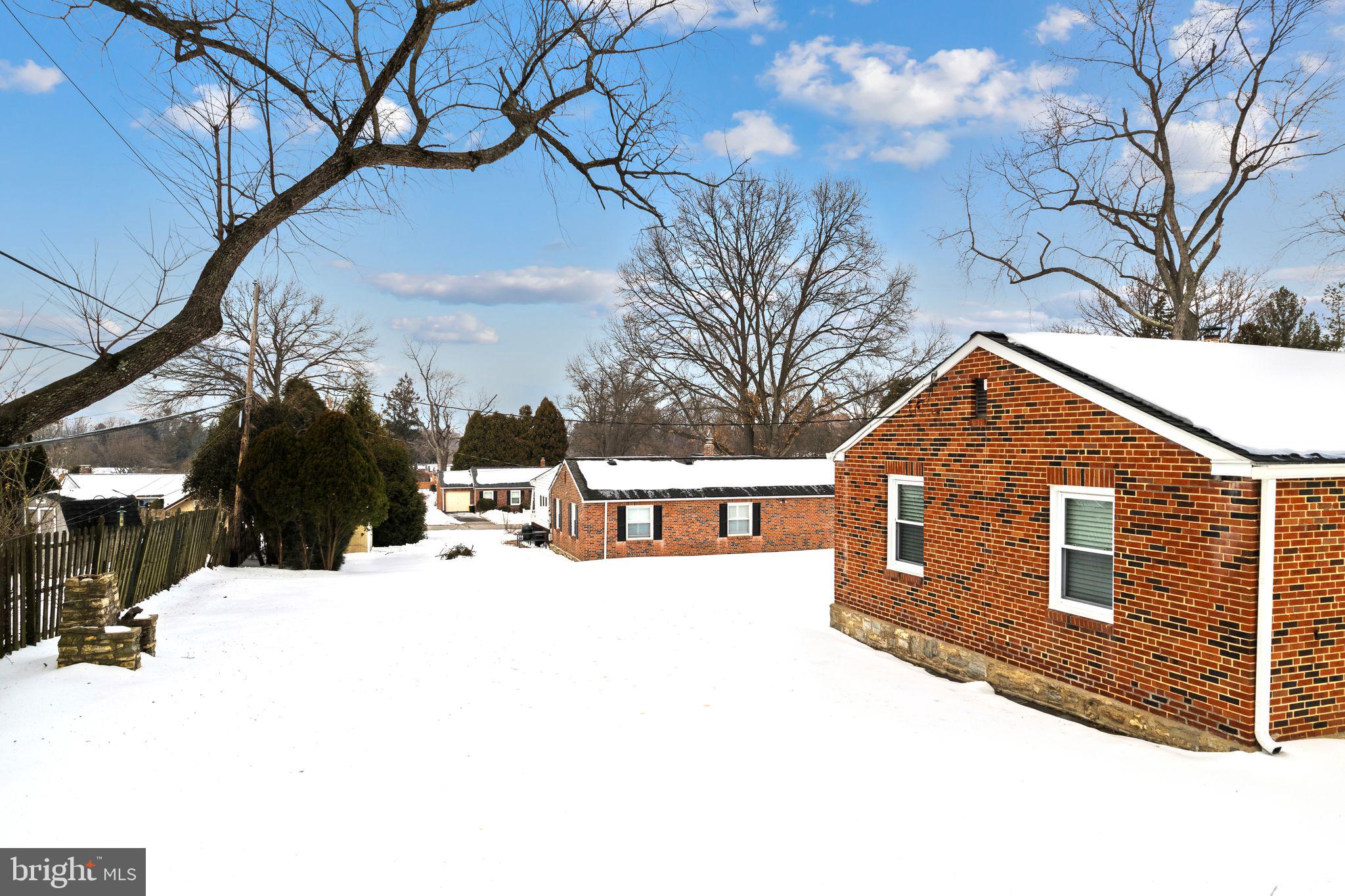 910 Edann Road Oreland, PA 19075 - Photo 26 of 26 a view of a house with snow on the road