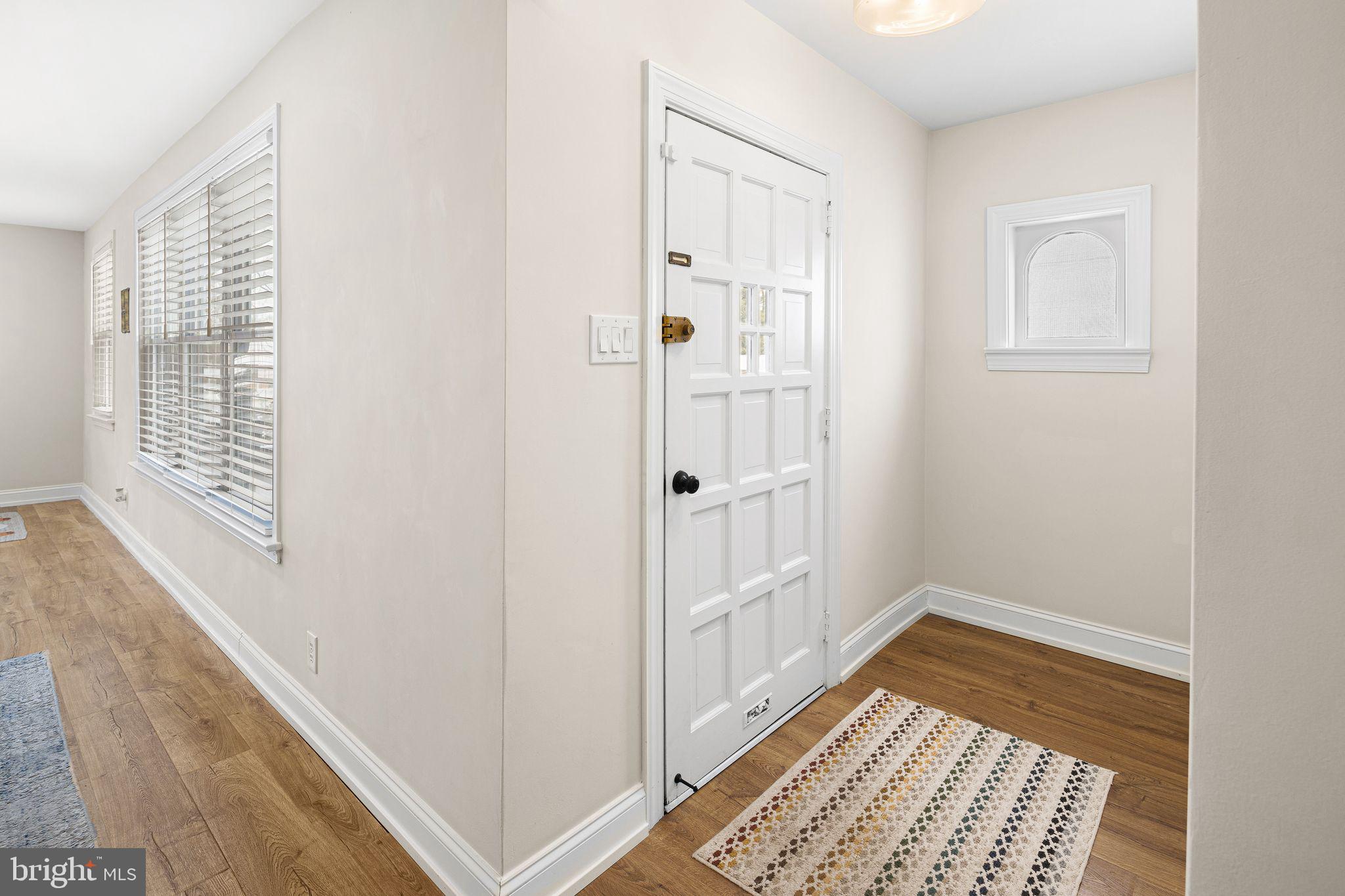 910 Edann Road Oreland, PA 19075 - Photo 5 of 26 a view of a hallway with windows