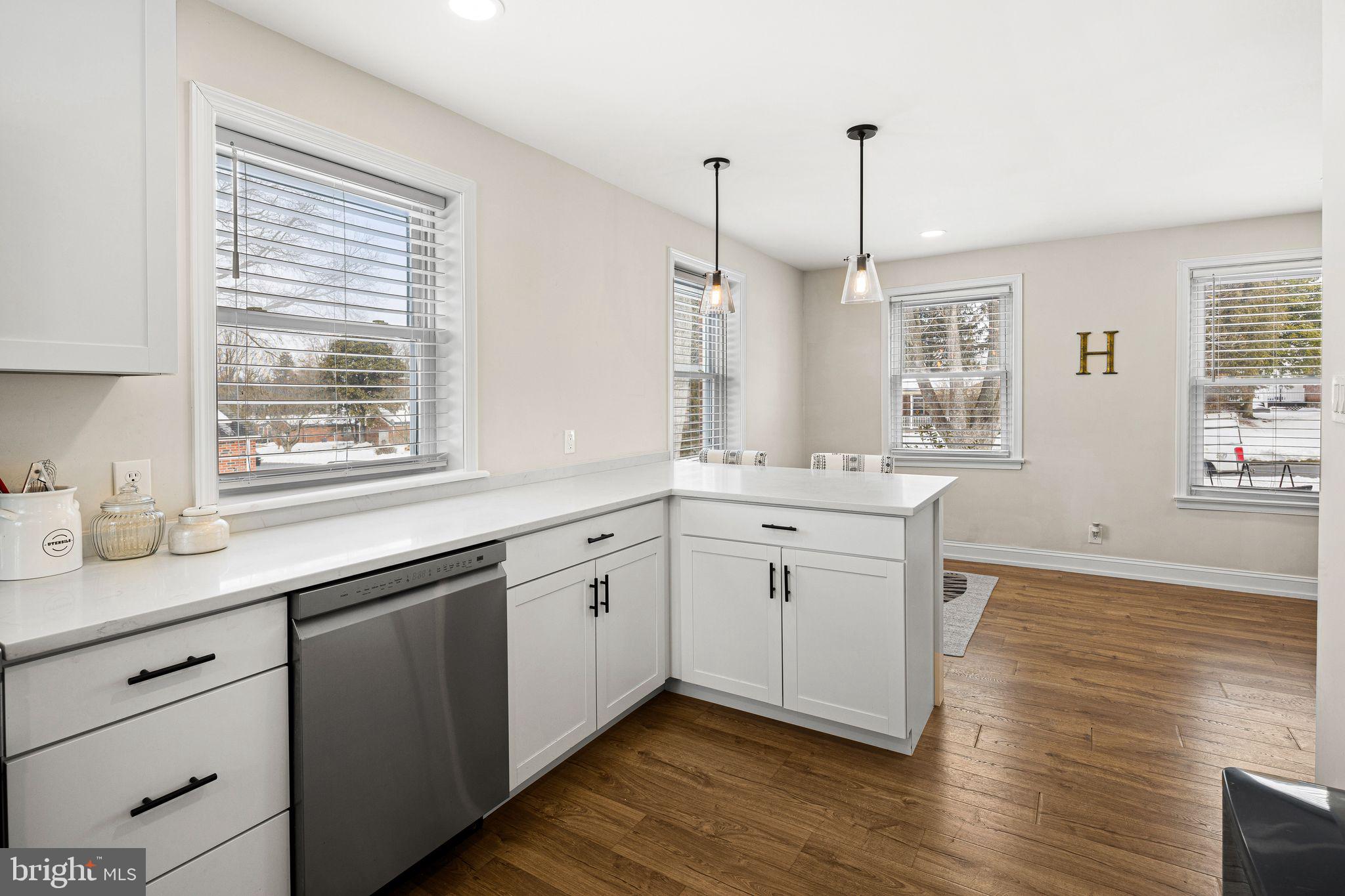 910 Edann Road Oreland, PA 19075 - Photo 10 of 26 a spacious bathroom with double vanity and a window