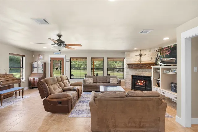 a bed room with a bed and a fireplace