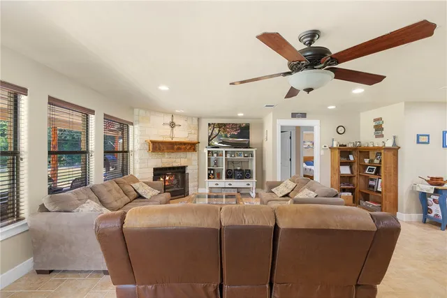 a bedroom with a bed furniture and a flat screen tv