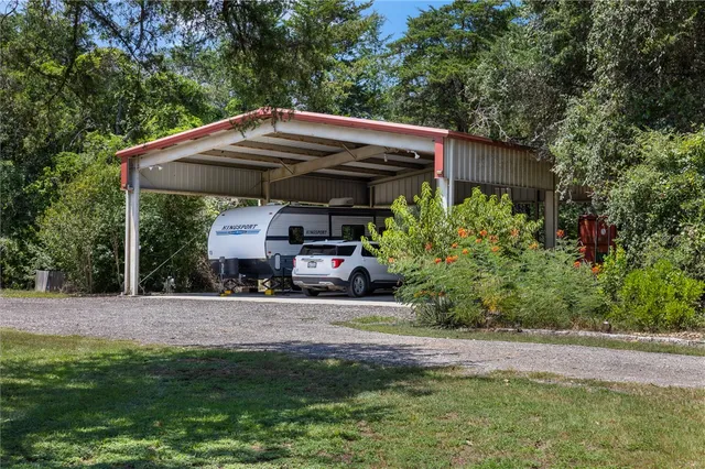 a view of a car parked in front of house
