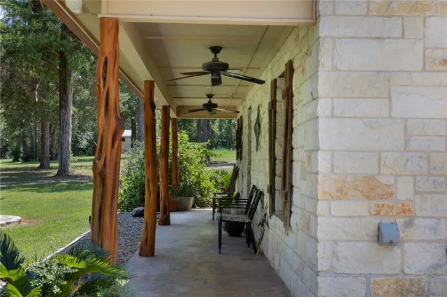 a view of a porch with seating space