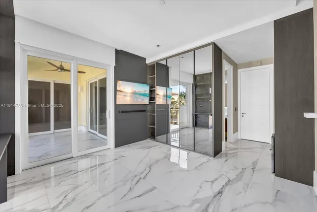 a bathroom with a shower and a sink
