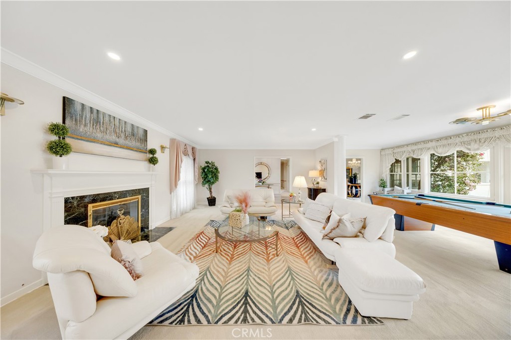 2835 Devonport Road San Marino, CA 91108 - Photo 6 of 54 a living room with furniture large window and fireplace