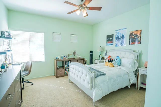 a spacious bathroom with sink and shower