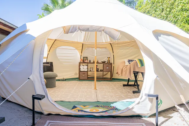 a view of a swimming pool with a patio