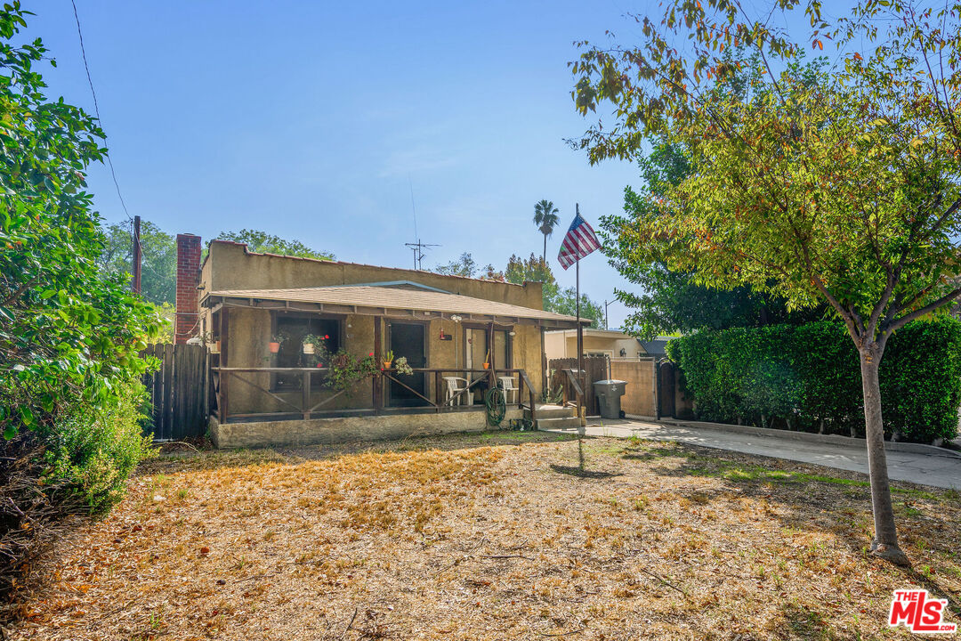 524 Hazel Street Glendale, CA 91201 - Photo 2 of 7 a front view of a house with a yard and garage