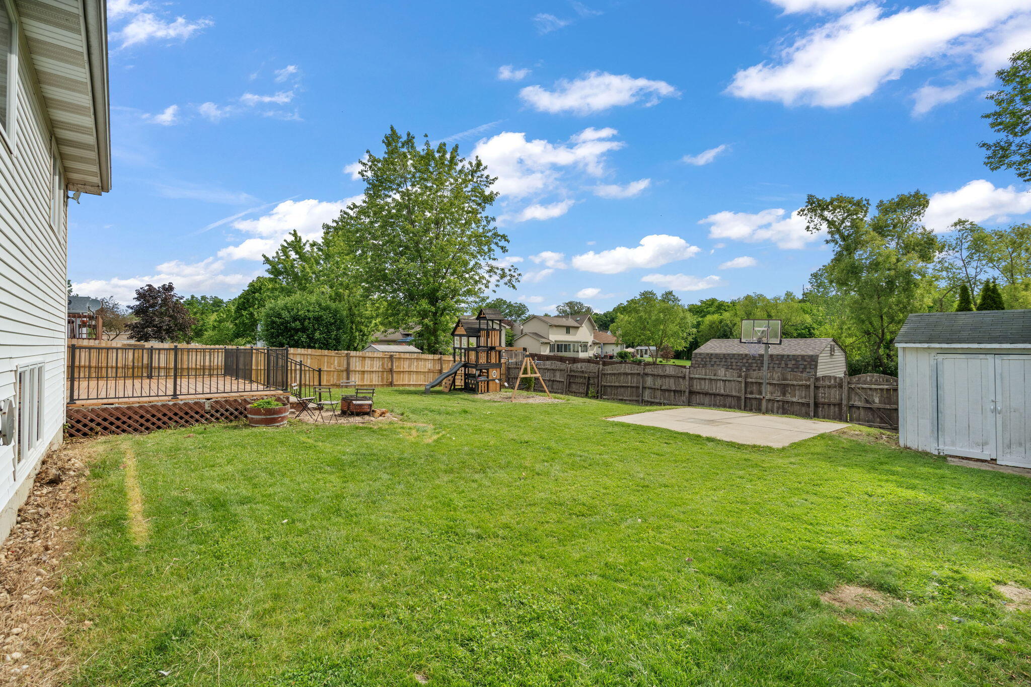8987 Calhoun Place Crown Point, IN 46307 - Photo 28 of 28 a view of a garden and basketball court