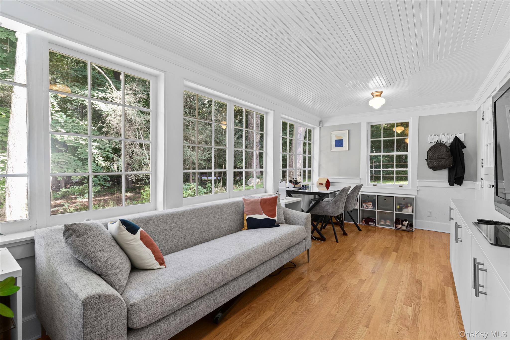 131 Douglas Road Chappaqua, NY 10514 - Photo 10 of 26 a living room with furniture and large window