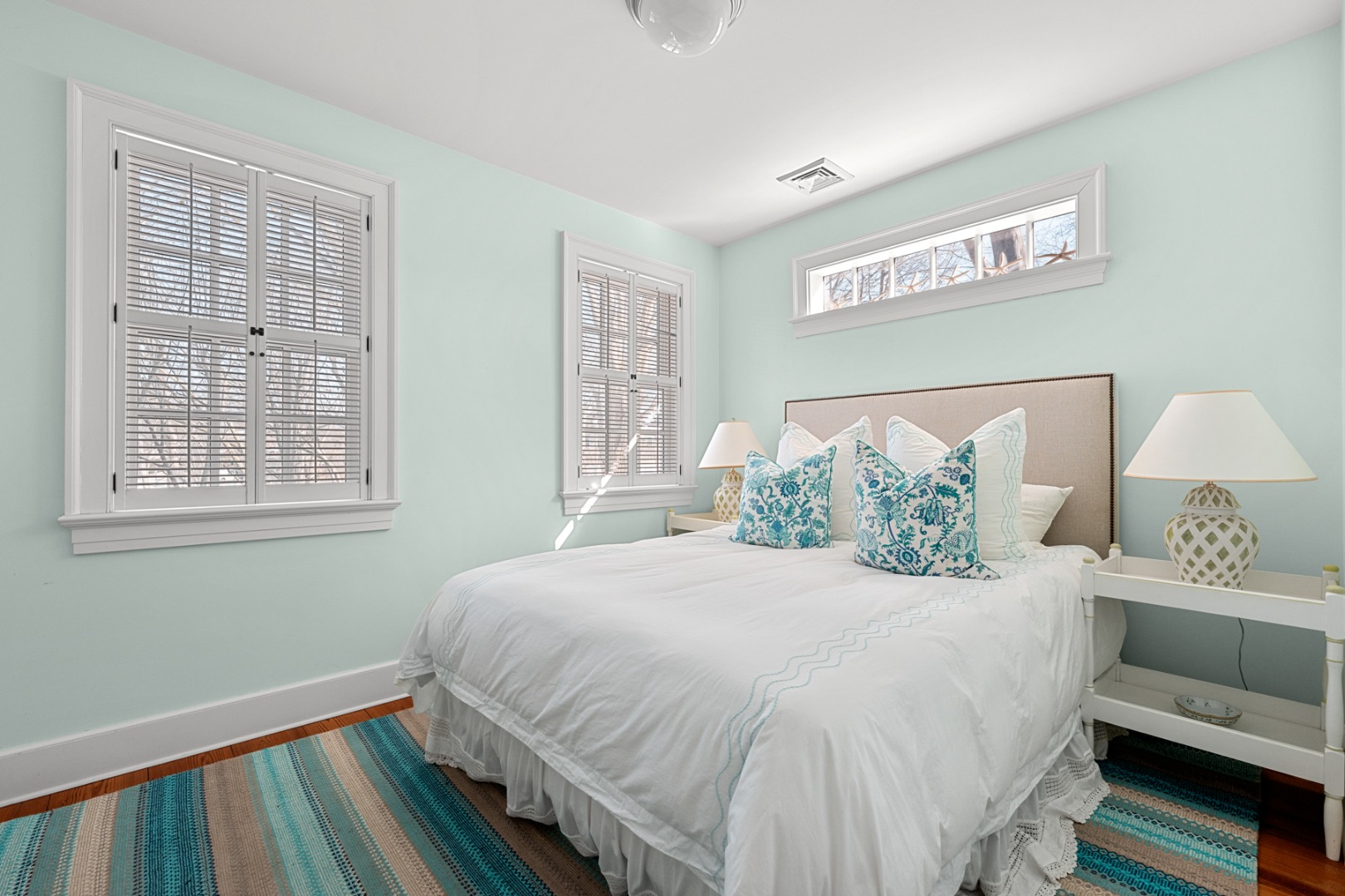 18 Mill Street Nantucket, MA 02554 - Photo 44 of 47 a bedroom with a bed and a window
