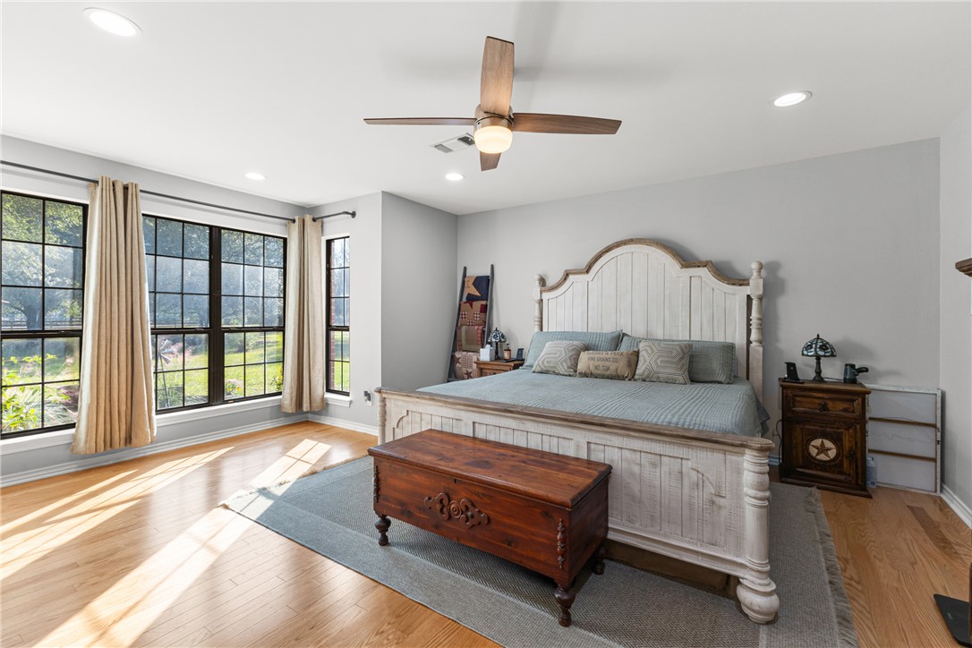 31928 Reids Prairie Road Waller, TX 77484 - Photo 19 of 43 Bedroom with light wood-type flooring, recessed lighting, and a ceiling fan
