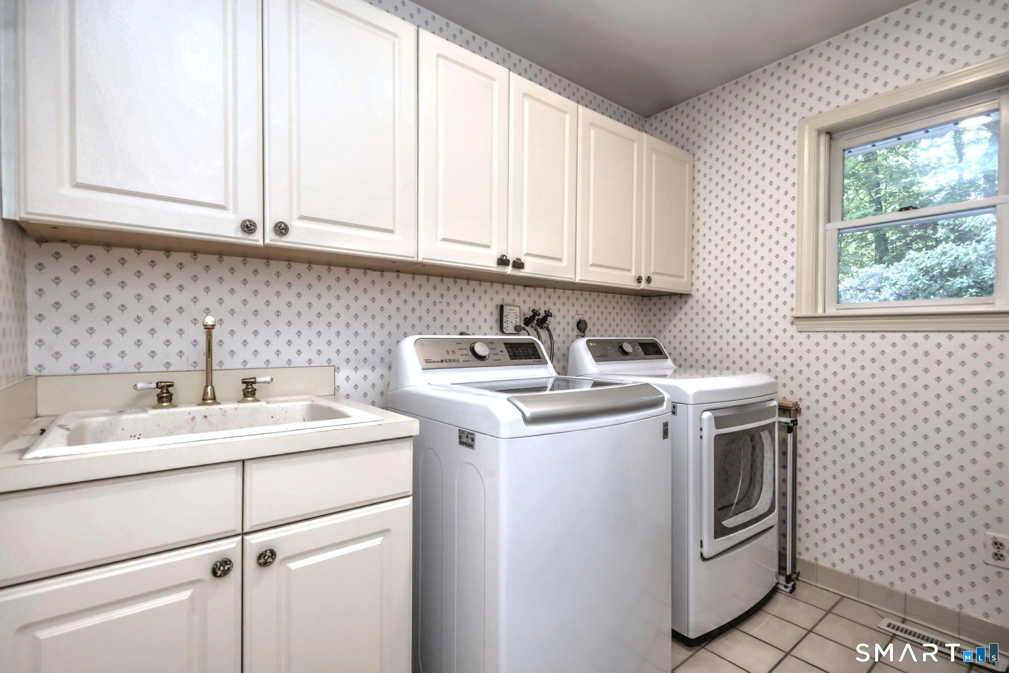 60 West Meadow Road Hamden, CT 06518 - Photo 17 of 35 The laundry room is also off the hallway coming in from the garage. There is also a nice large pantry off that hallway.