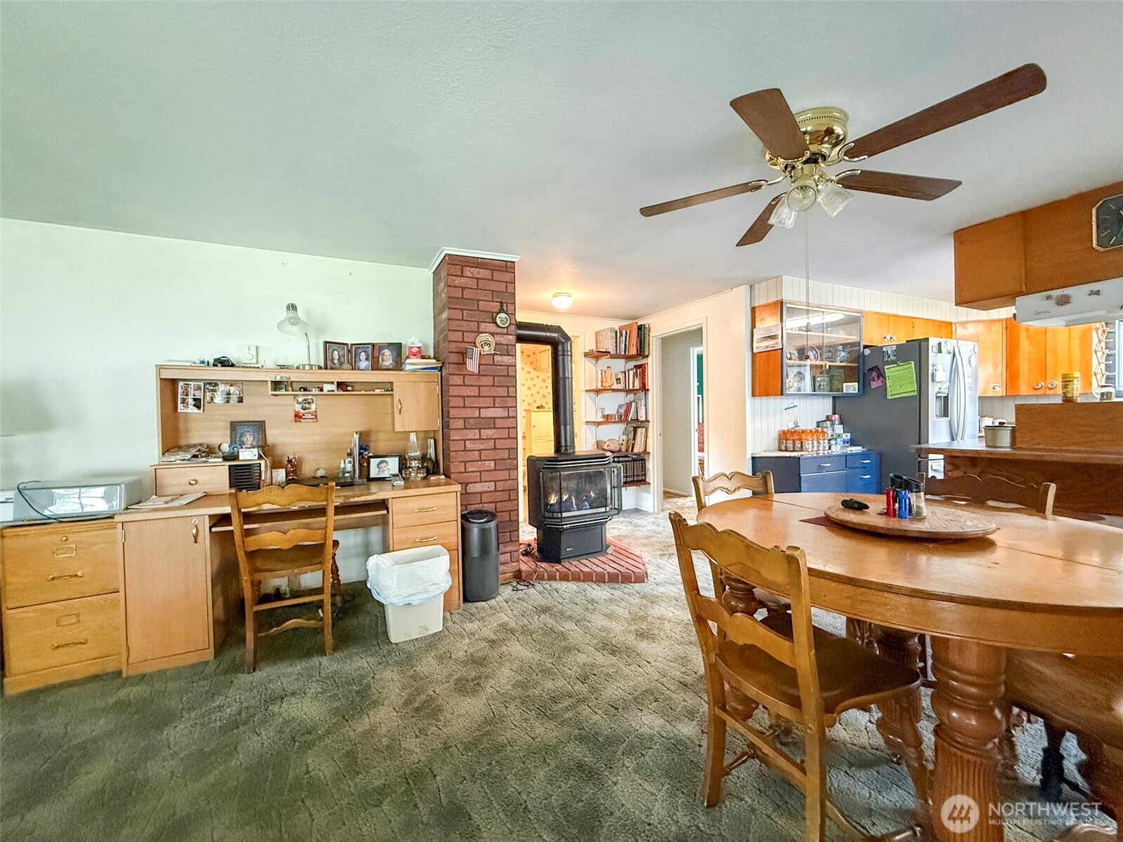 518 Bridge Street Twisp, WA 98856 - Photo 8 of 40 a kitchen with a table and chairs in it