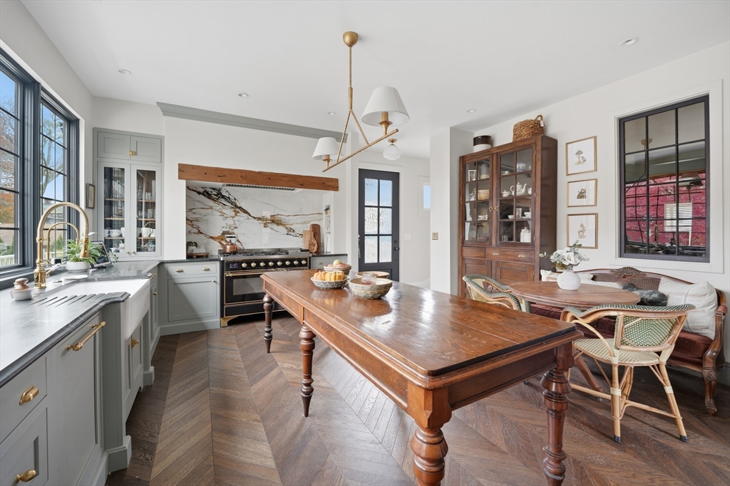 a view of a dining room with furniture window and outside view