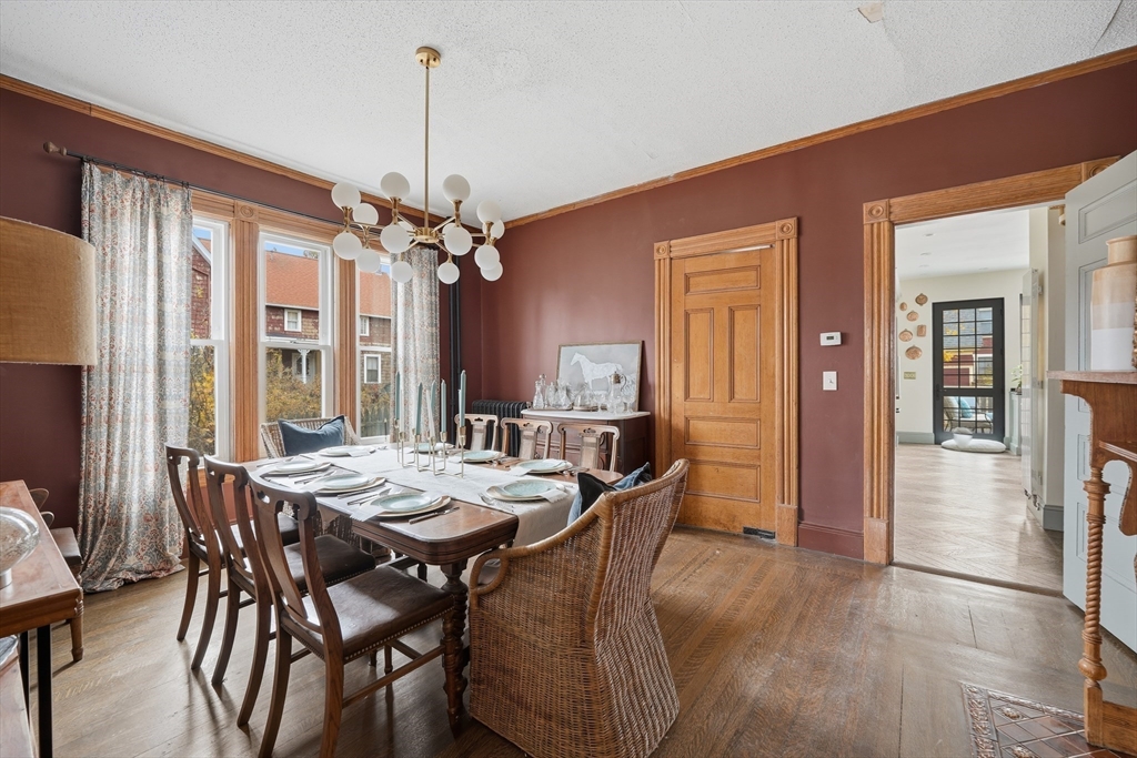 151 Lincoln Street Holyoke, MA 01040 - Photo 11 of 36 a view of a dining room with furniture window and wooden floor