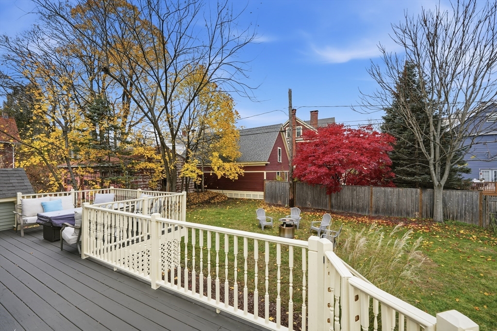 151 Lincoln Street Holyoke, MA 01040 - Photo 34 of 36 a view of a wooden deck and trees with wooden fence