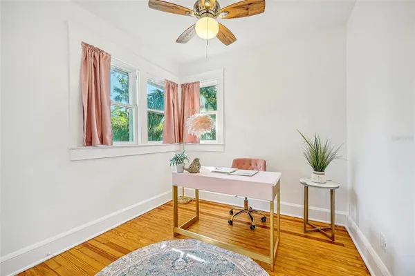a living room with furniture and window