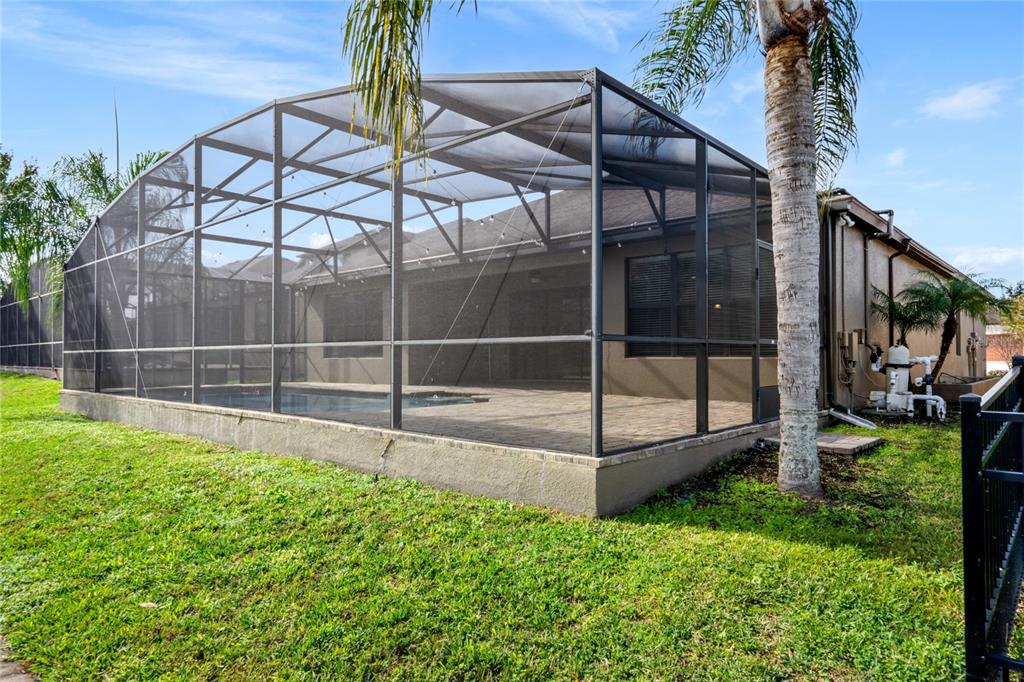 7167 Beek Street Windermere, FL 34786 - Photo 37 of 63 a view of yard from deck having patio