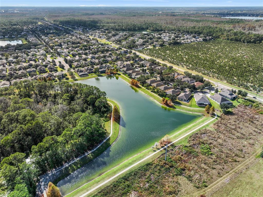 7167 Beek Street Windermere, FL 34786 - Photo 41 of 63 an aerial view of a house with a yard
