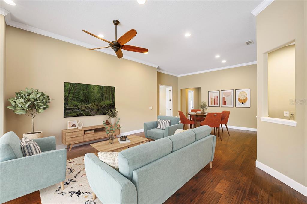 7167 Beek Street Windermere, FL 34786 - Photo 53 of 63 a living room with furniture and a flat screen tv