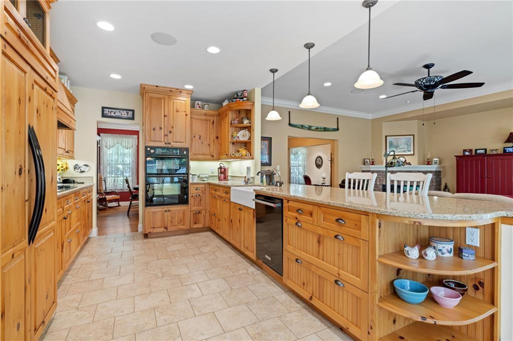 287 Garner Road Edinburg, PA 16116 - Photo 15 of 49 a large kitchen with lots of counter space and stainless steel appliances