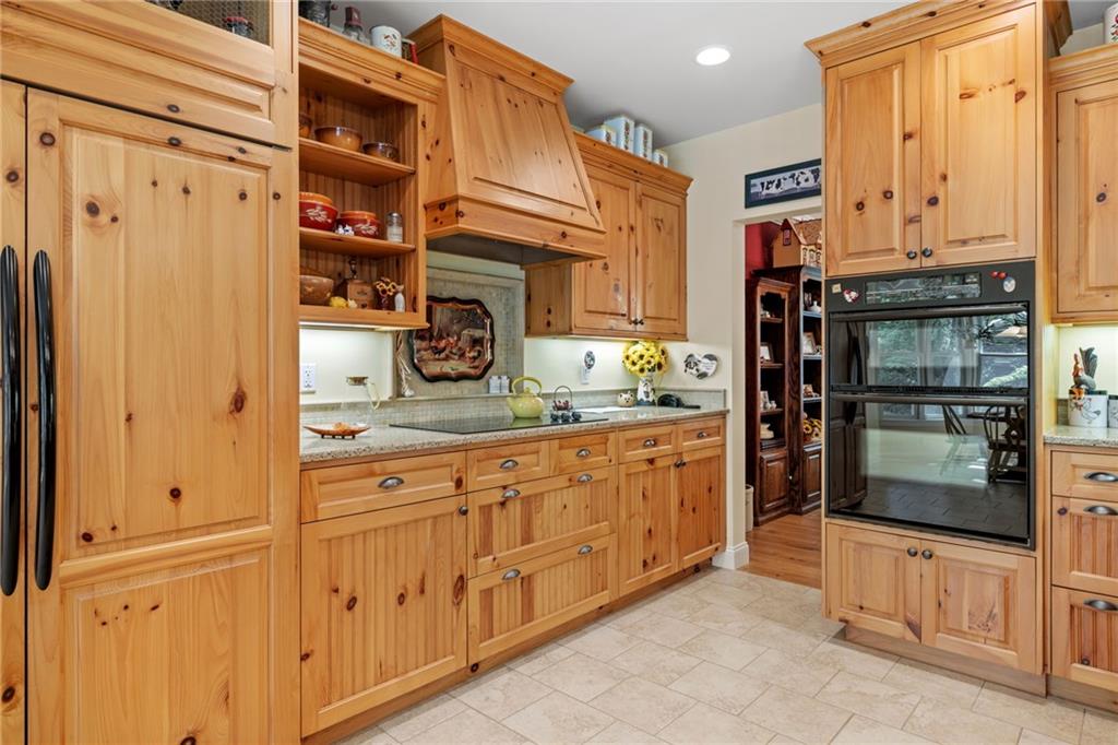 287 Garner Road Edinburg, PA 16116 - Photo 16 of 49 a kitchen with stainless steel appliances a refrigerator and cabinets