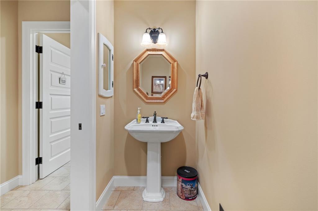287 Garner Road Edinburg, PA 16116 - Photo 26 of 49 a bathroom with a sink and a mirror