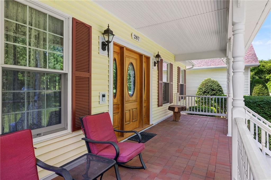287 Garner Road Edinburg, PA 16116 - Photo 3 of 49 a view of a porch with furniture and yard