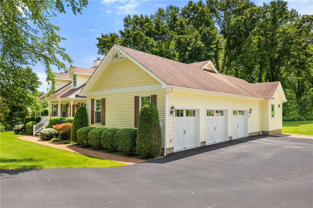 287 Garner Road Edinburg, PA 16116 - Photo 41 of 49 a view of a house with a yard plants and large tree