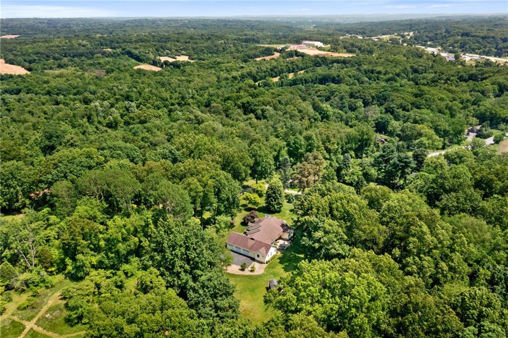 287 Garner Road Edinburg, PA 16116 - Photo 49 of 49 an aerial view of a residential houses with outdoor space and trees all around