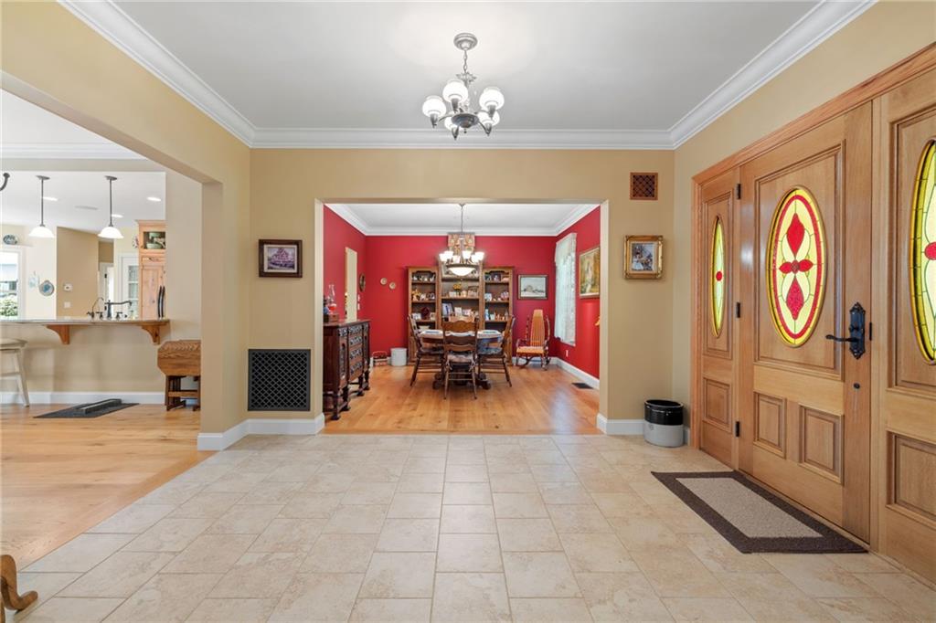 287 Garner Road Edinburg, PA 16116 - Photo 7 of 49 a view of a entryway with a chandelier