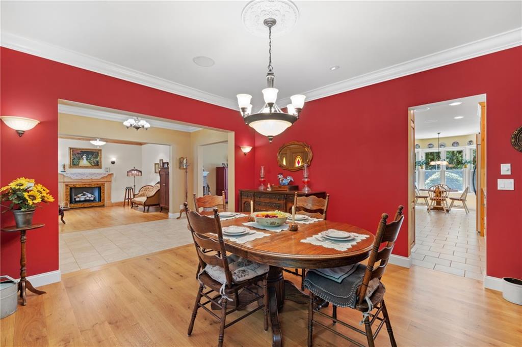 287 Garner Road Edinburg, PA 16116 - Photo 9 of 49 a view of a dining room with furniture and wooden floor
