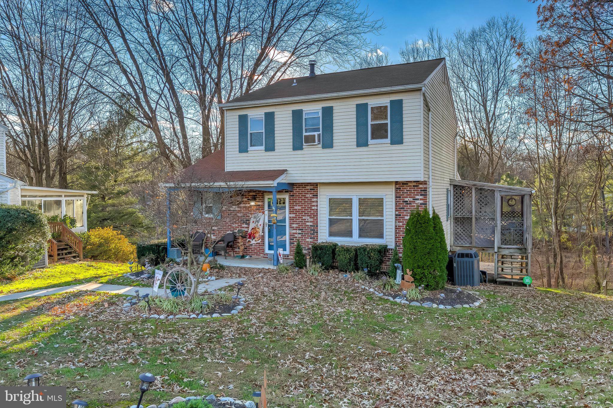 9326 Perglen Road Baltimore, MD 21236 - Photo 8 of 55 a front view of a house with garden and sitting area