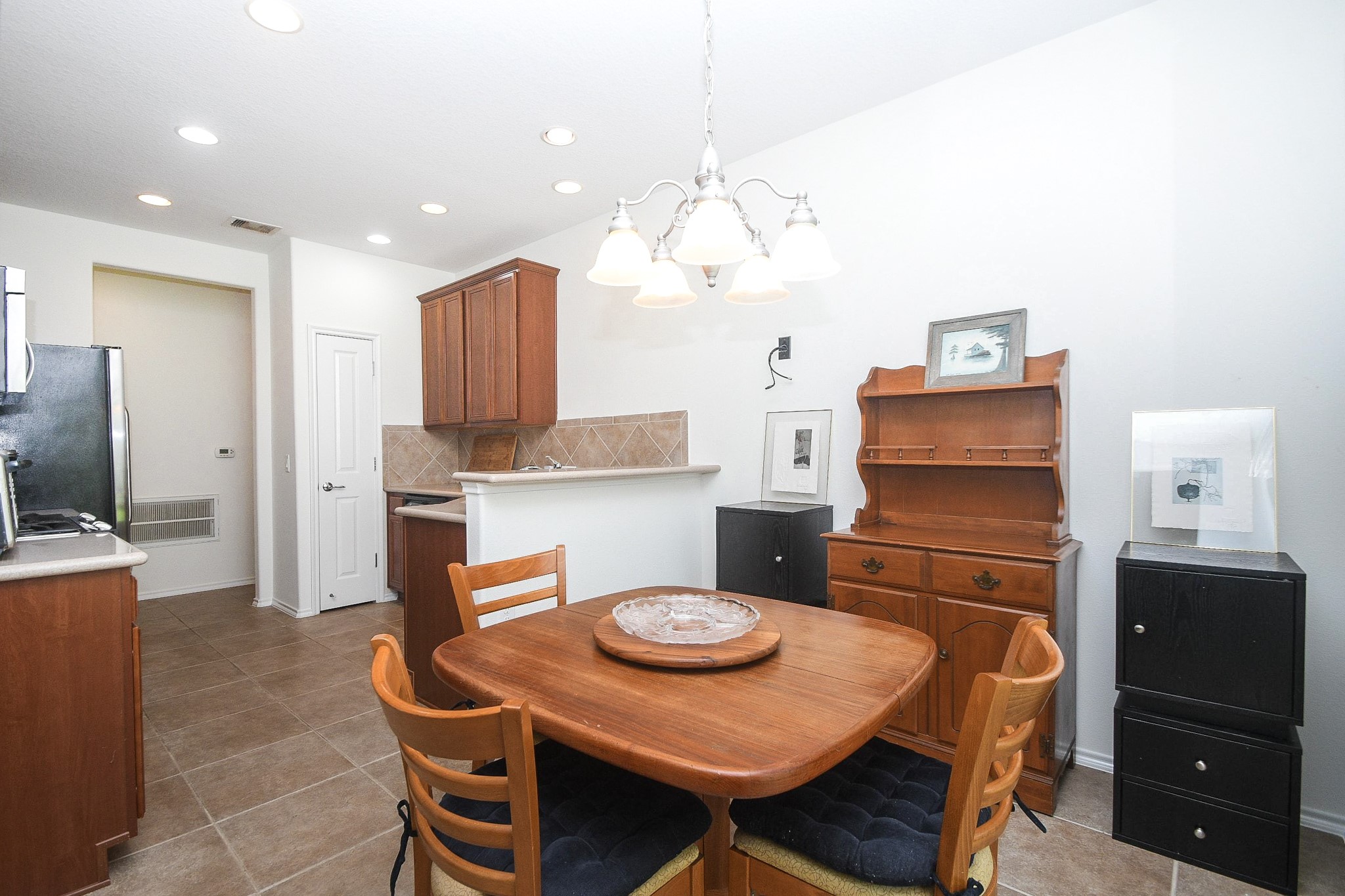 13600 Breton Ridge Street, Unit 36F Houston, TX 77070 - Photo 21 of 38 Bright dining space perfect for casual meals and gatherings.