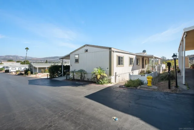 a view of a street with cars