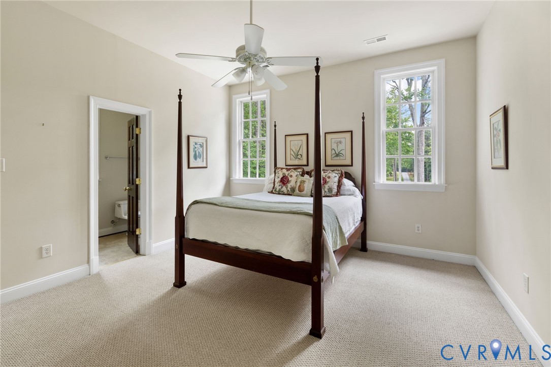 13173 Scotchtown Road Beaverdam, VA 23015 - Photo 40 of 65 a bed room with a bed and a chair