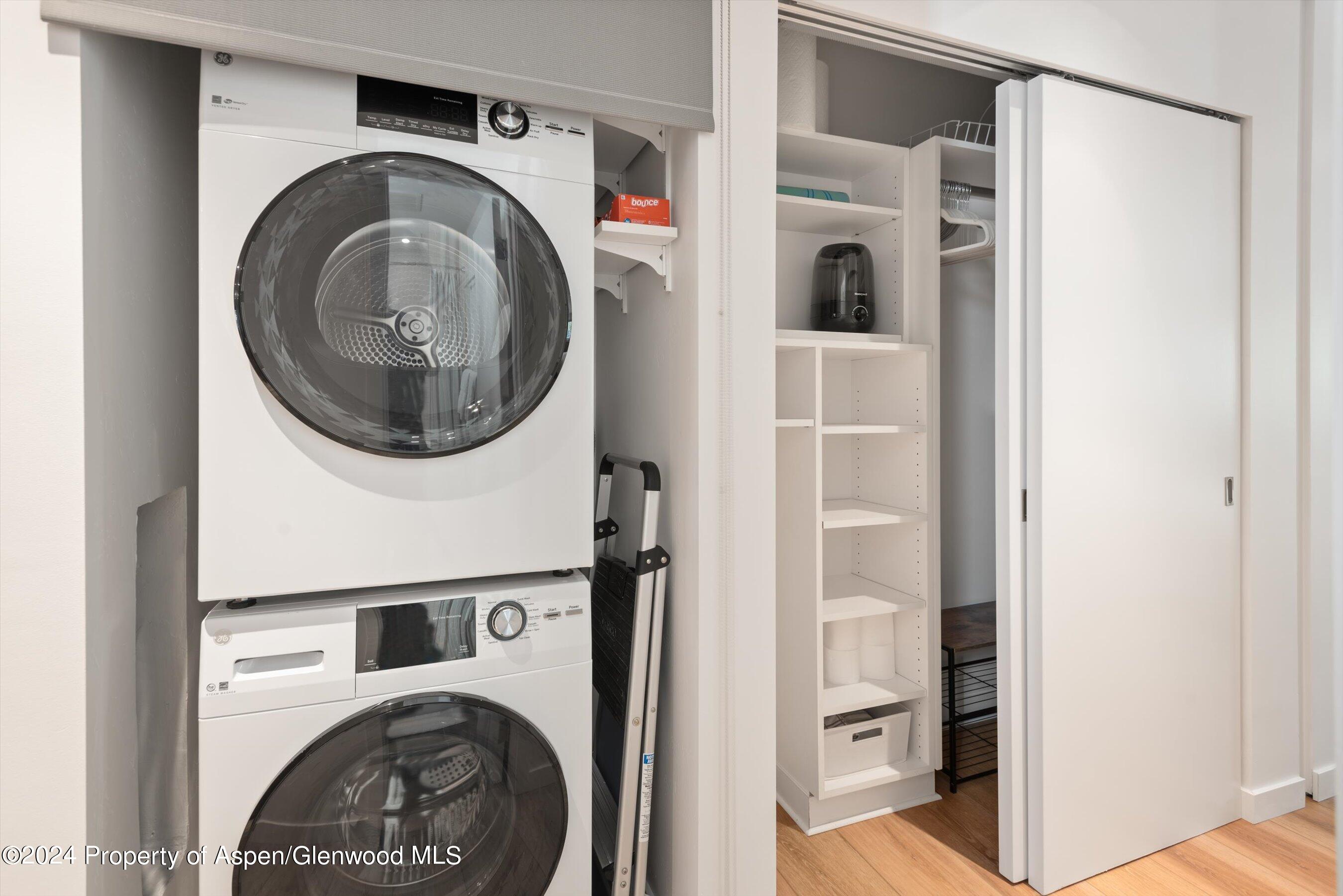 100 East Dean Street, Unit 1E Aspen, CO 81611 - Photo 8 of 10 a view of a hallway with washer and dryer