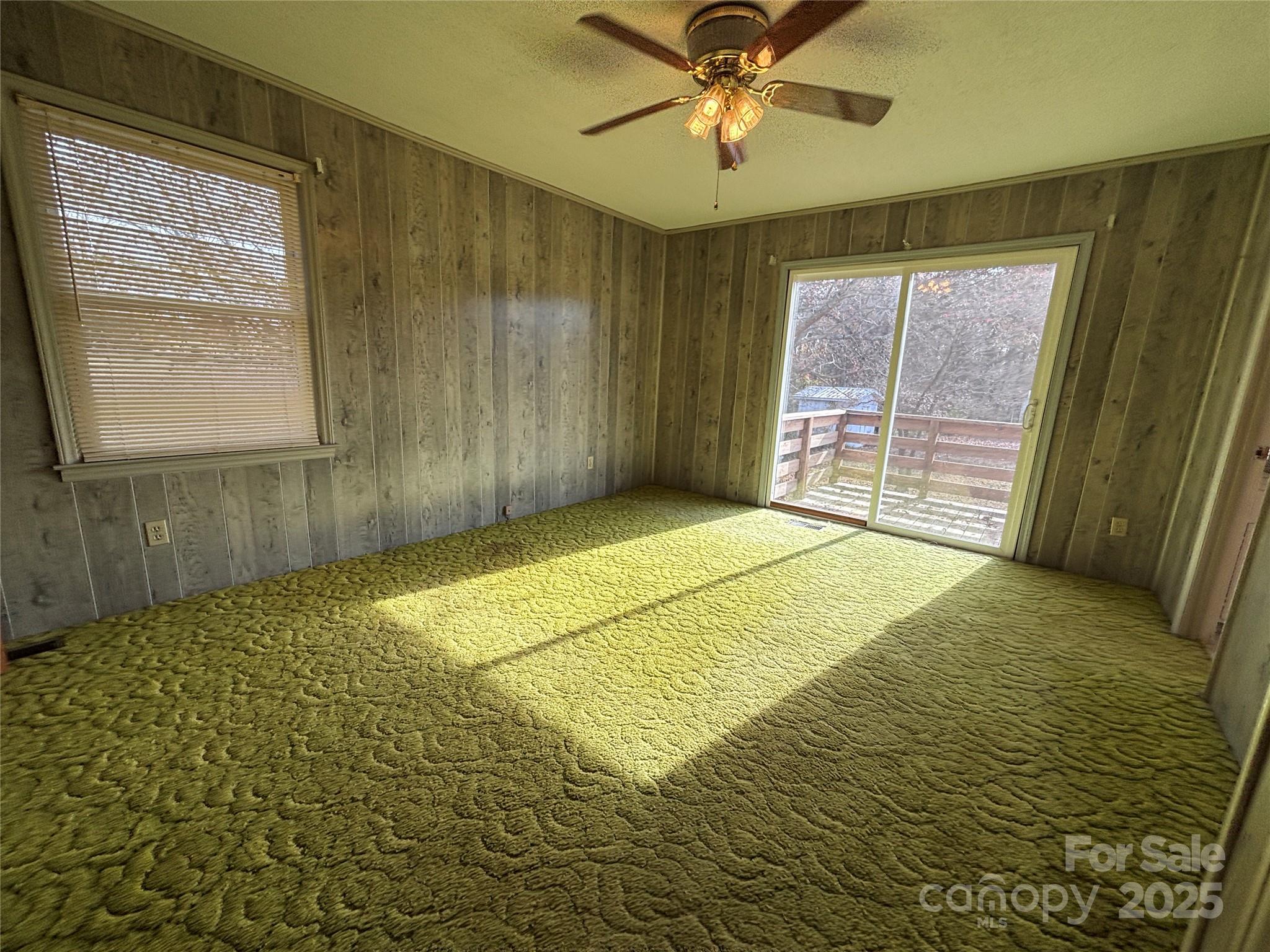 14740 Hatley-Burris Road Oakboro, NC 28129 - Photo 17 of 26 a view of an empty room with a window