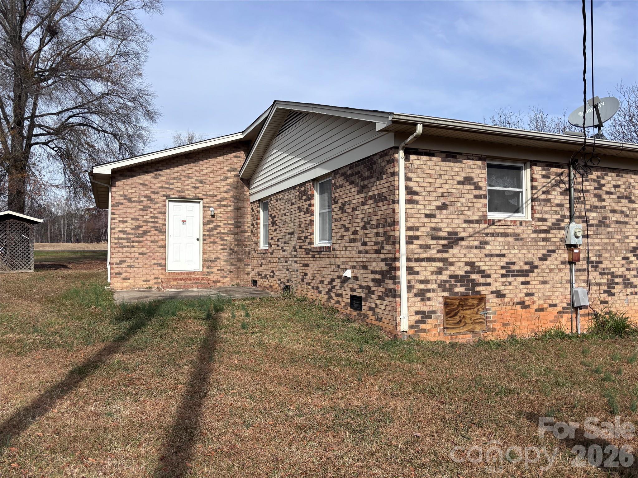14740 Hatley-Burris Road Oakboro, NC 28129 - Photo 23 of 24 a view of a house with a outdoor space