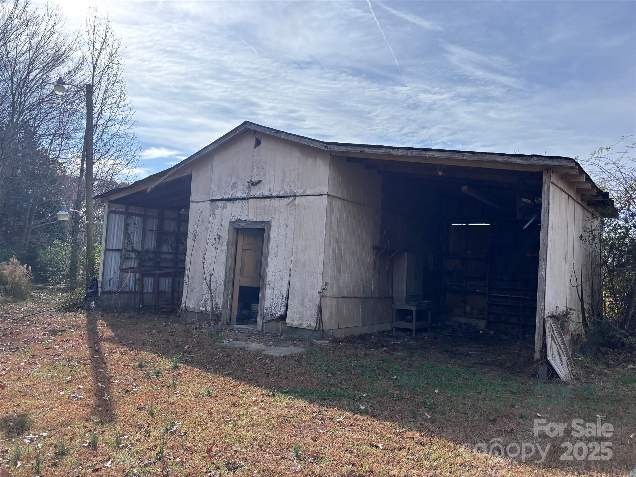14740 Hatley-Burris Road Oakboro, NC 28129 - Photo 7 of 26 a house view with a outdoor space