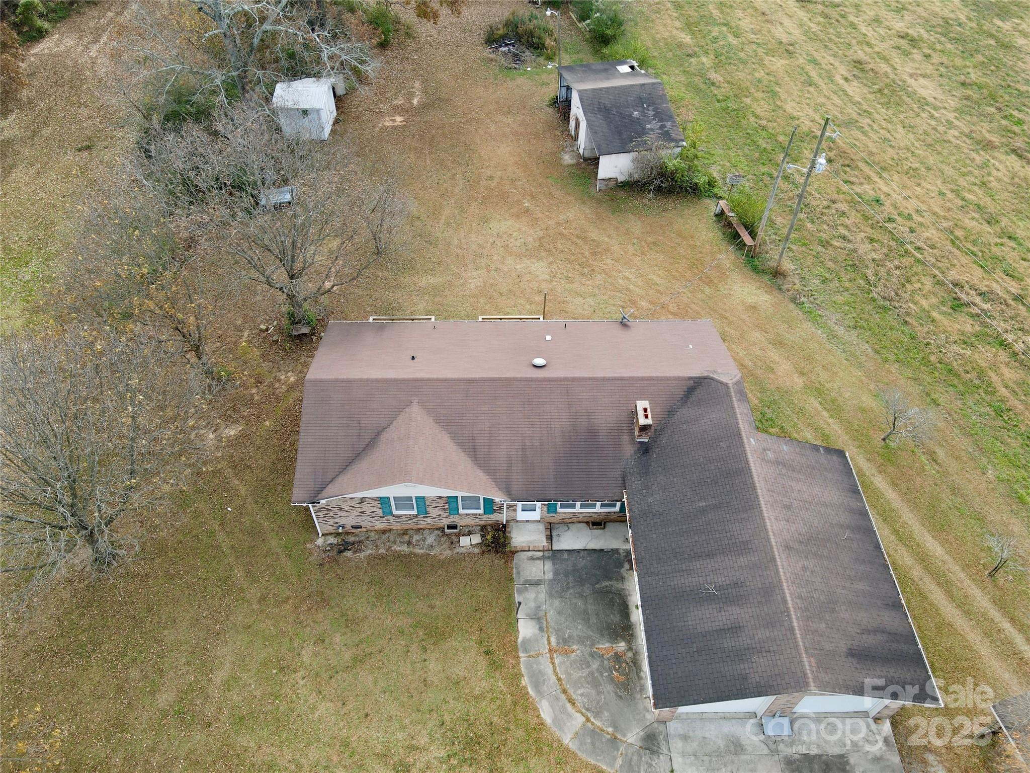 14740 Hatley-Burris Road Oakboro, NC 28129 - Photo 8 of 26 an aerial view of a house with a yard